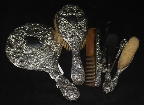 A silver mirror & brush set